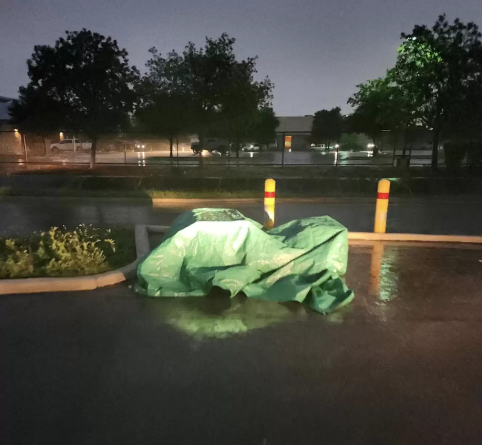 photo of tarp in a parking lot